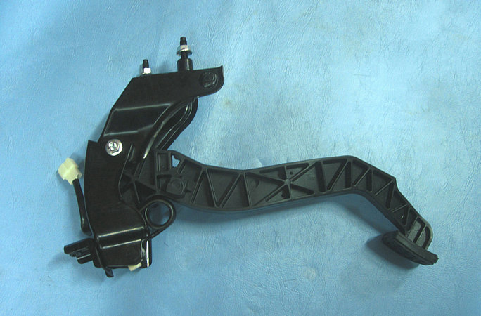 Clutch control mechanism with pedal assembly