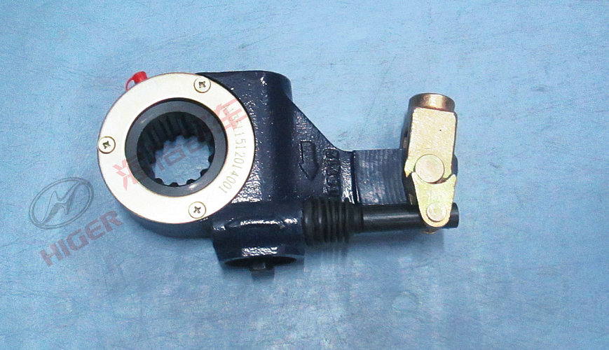 Rear brake adjustment arm assembly