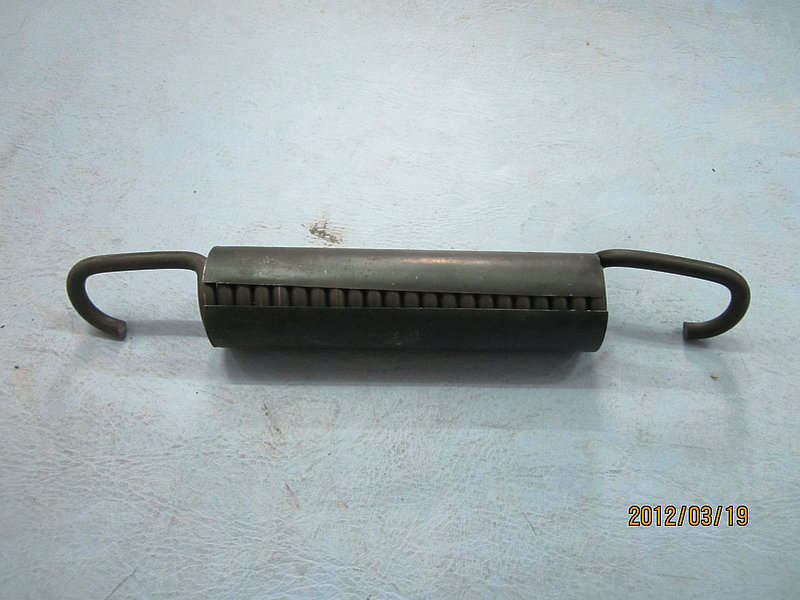 Rear return spring assembly