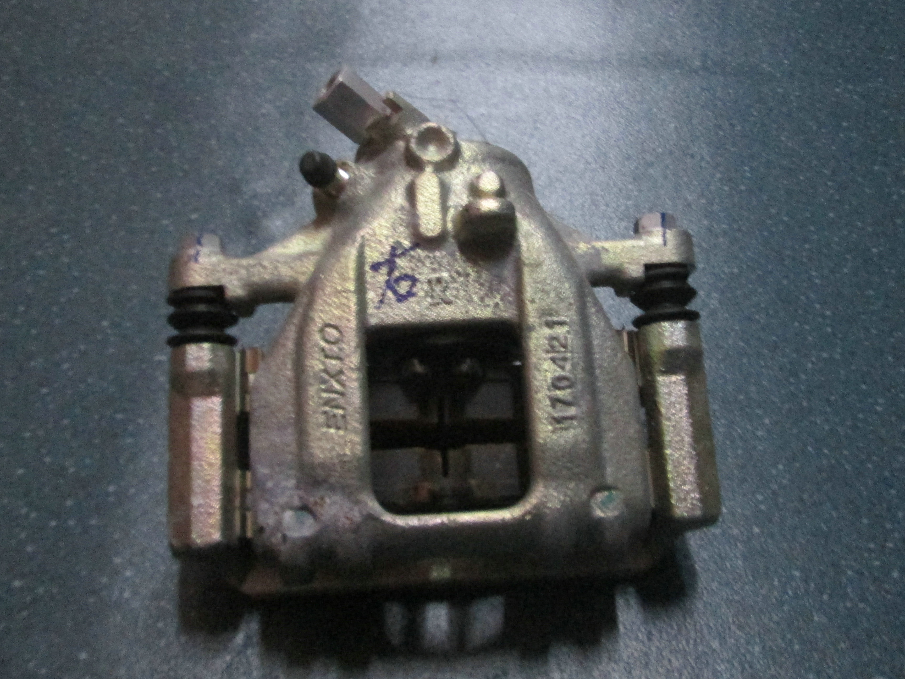 Rear brake caliper assembly (right)