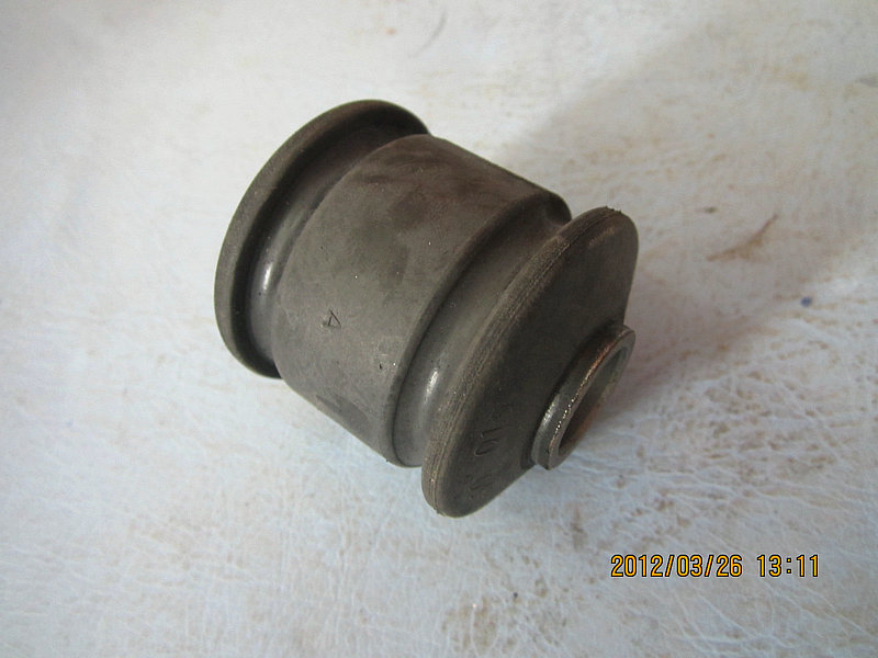 Rear shock absorber bushing