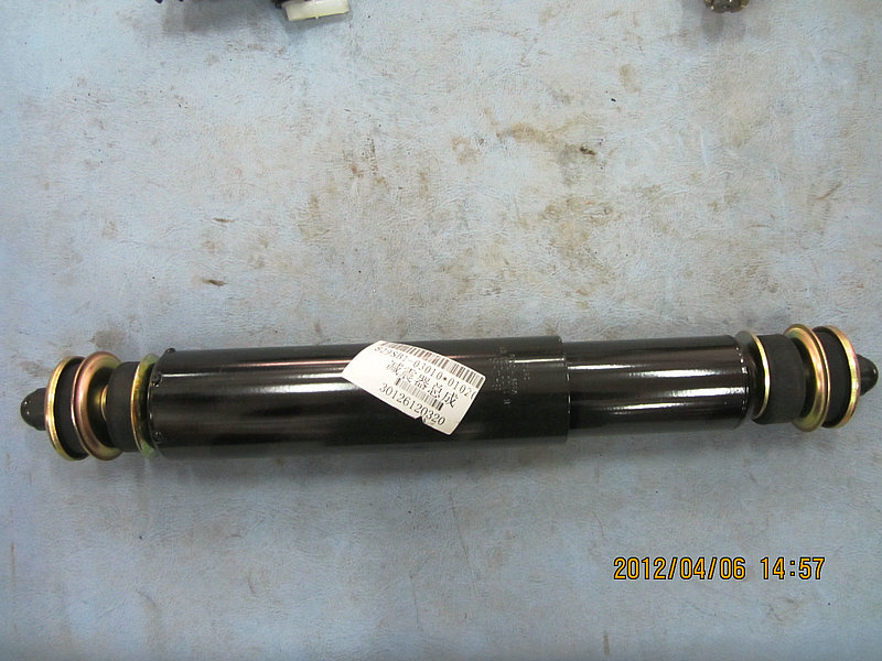 Front shock absorber assembly