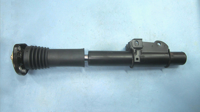 Front shock absorber assembly