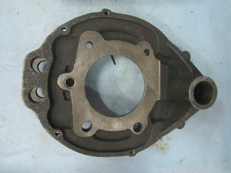 Front left brake base plate with bushing assembly