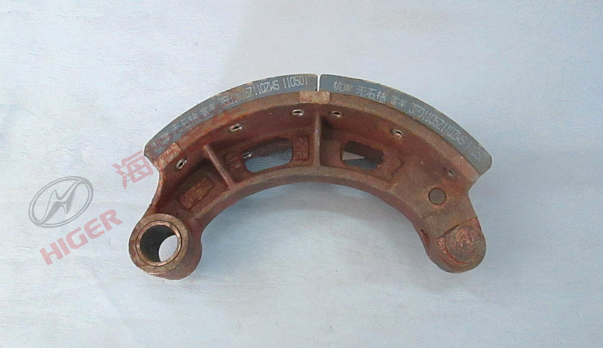 Front brake shoe with bushing assembly