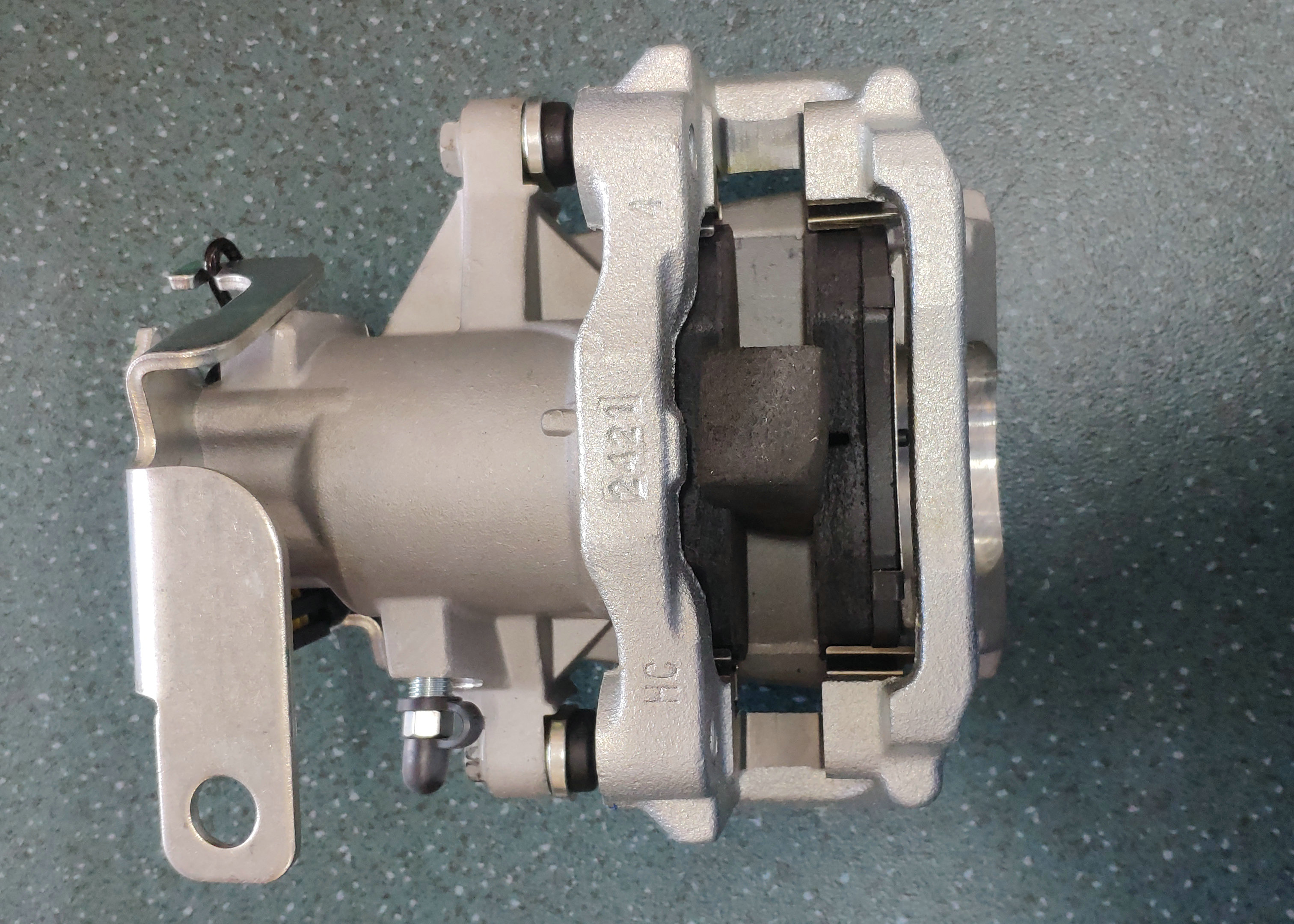 Rear brake caliper assembly (right)