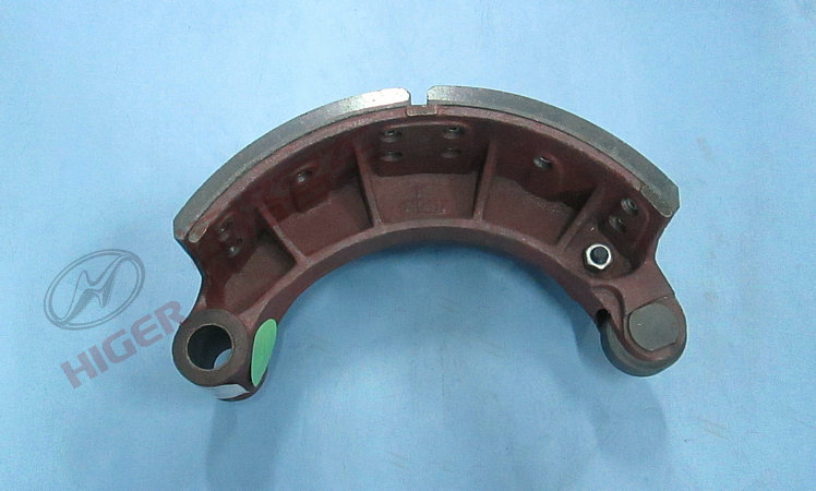 Rear brake shoe with bushing assembly