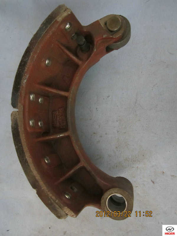 Rear lower brake shoe with friction plate and roller assembly