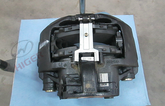 Left brake caliper assembly