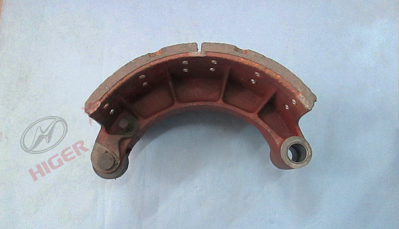 Rear lower brake shoe with friction plate and roller assembly
