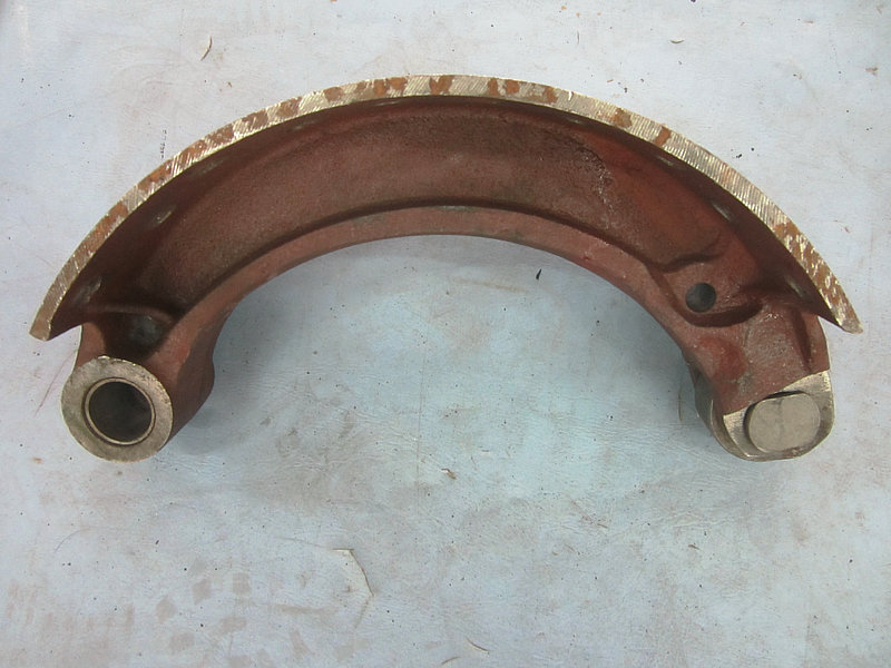Front brake shoe and bushing assembly
