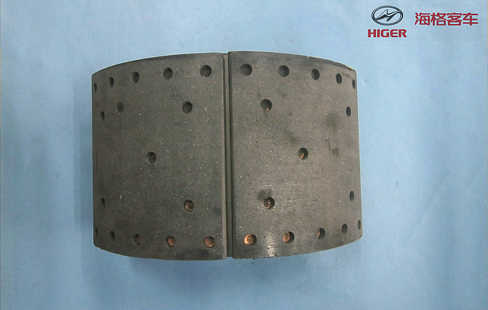 Rear brake shoe and friction plate with roller assembly