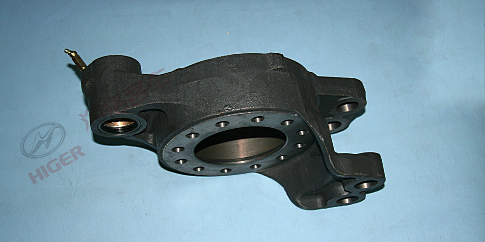 Rear brake base plate with bushing assembly
