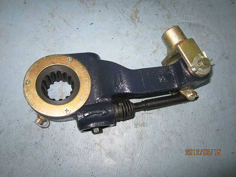 Front left self-adjustment arm assembly