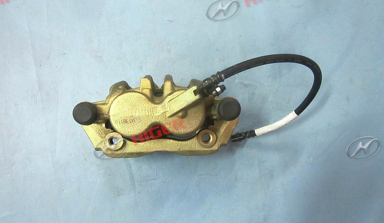 Тормозной калипер (слева)