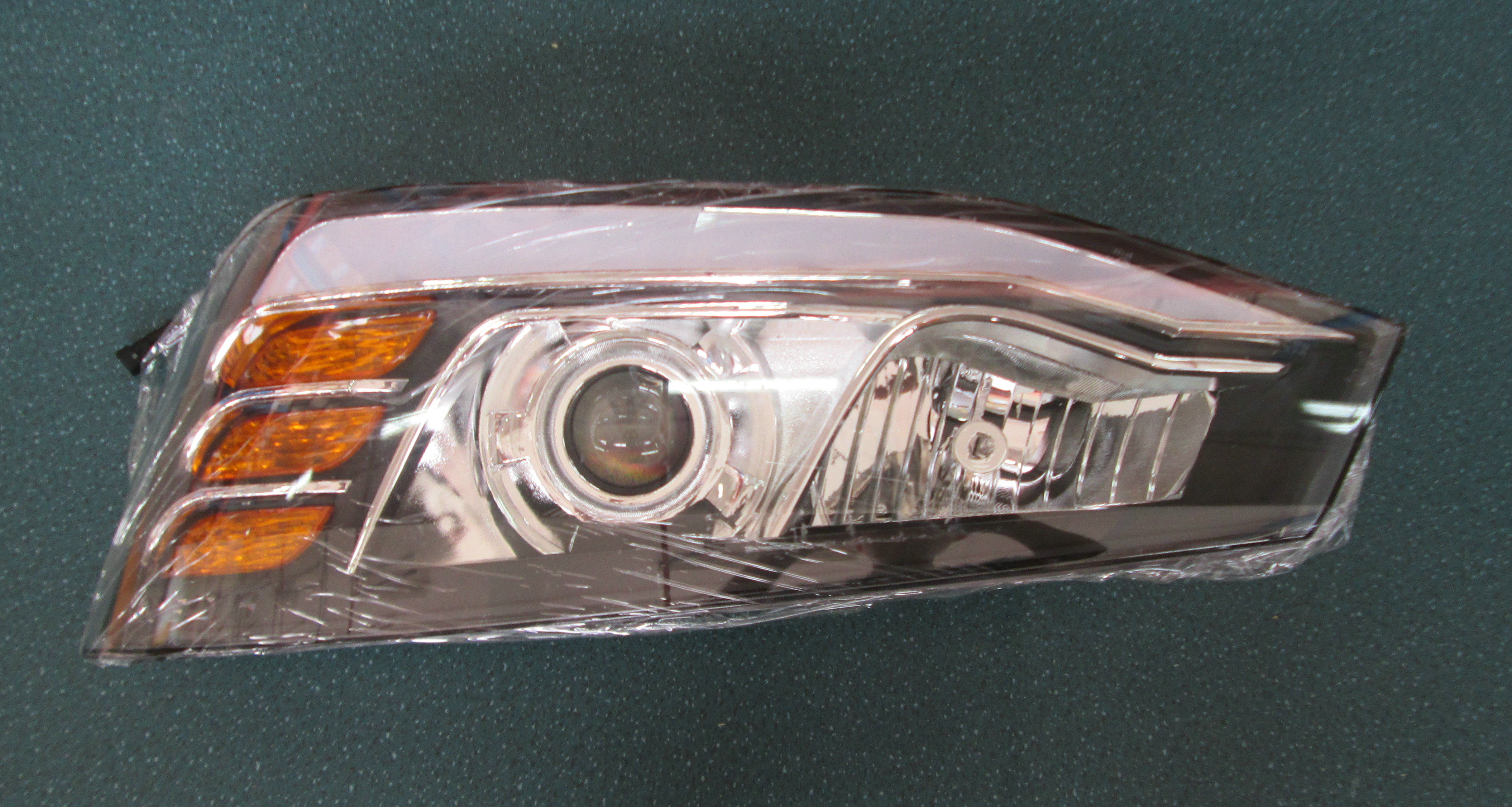 Left front combination light (day running light with electric adjustment)
