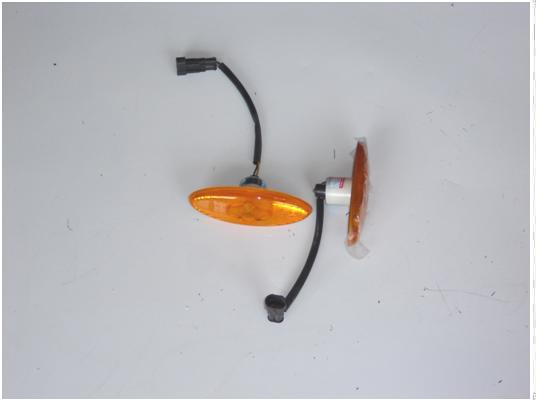 Side sign light (composite side reflector)