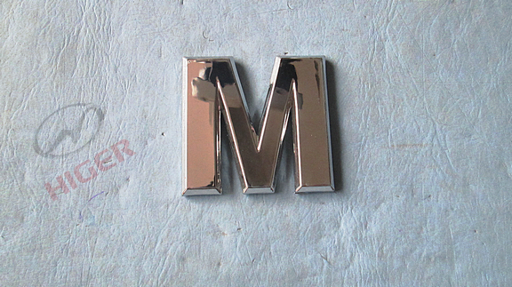 Signage (silver letter M)
