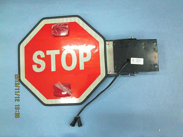 Parking signal arm (school bus)