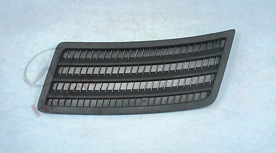 Air intake grille (upper left closed hole)
