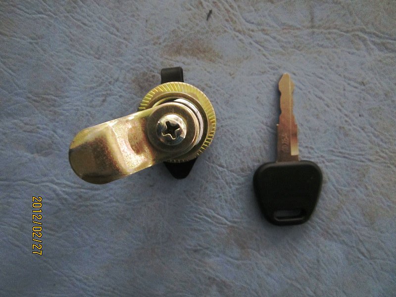 Lock assembly (four tank door lock)-1