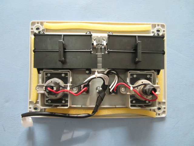 Adjustable air outlet with reading light