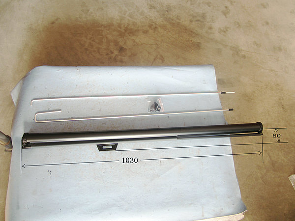 Sunshade (Asymmetric rearview mirror of driver window)