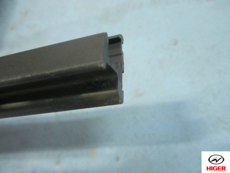 Flowing tank (behind beam of front lower window)