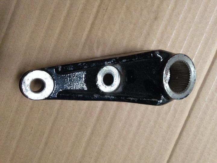 Front overhang twist arm assembly-2