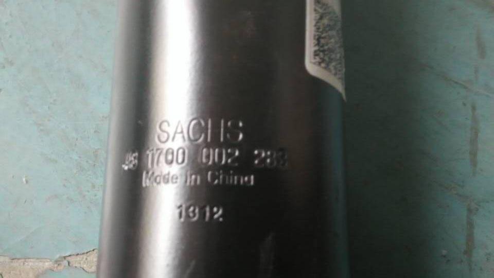 Shock absorber assembly, 50, 435, double hanging ring