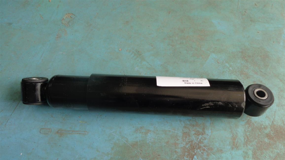 Shock absorber assembly, 50, 255, double hanging ring