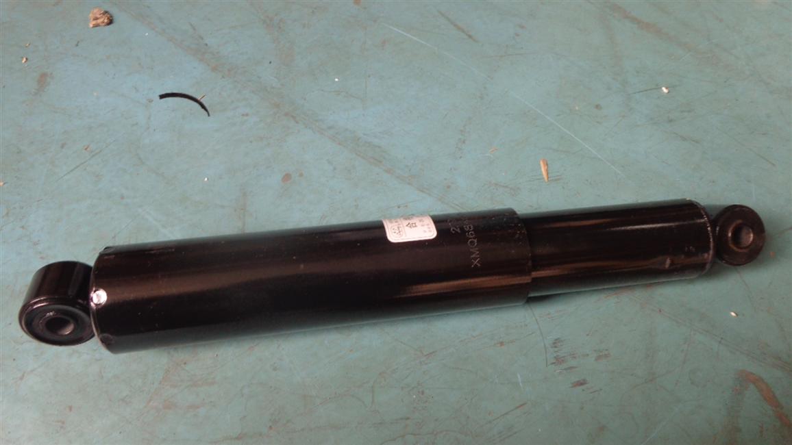 Shock absorber assembly, 50, 250, double hanging ring