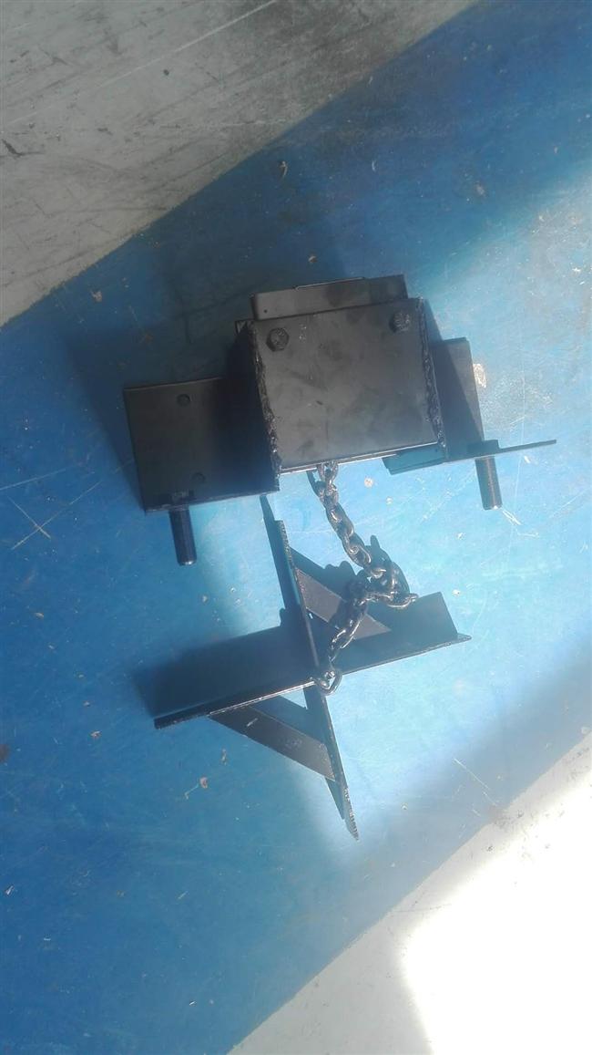 Spare tire lift assembly