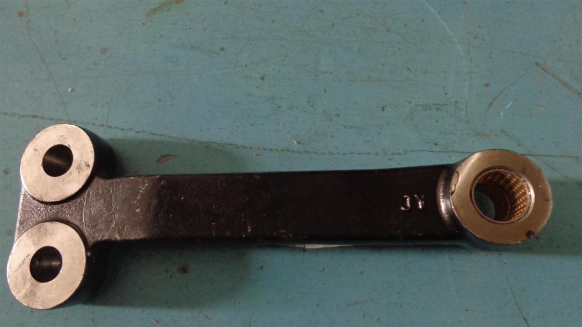 Steering center swing arm assembly