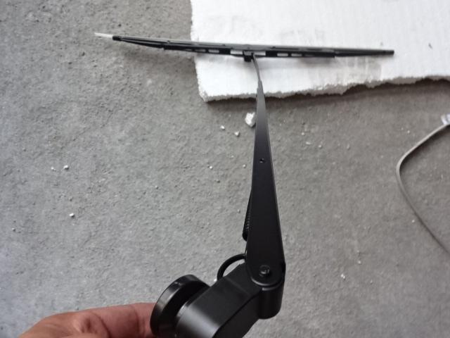 Main scraper arm and scraper assembly, left rudder, assembled driver's side