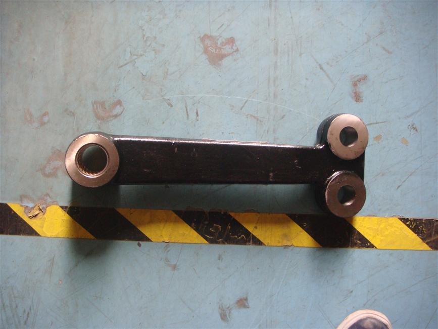 Steering center swing arm assembly