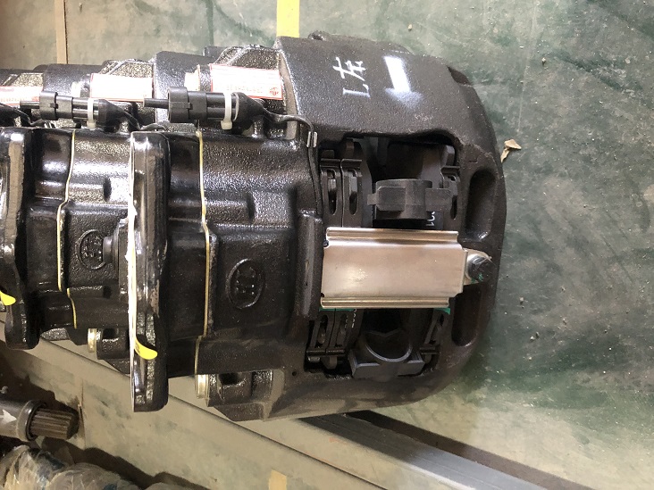 Caliper assembly (left)