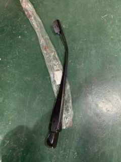 Left scraper assembly