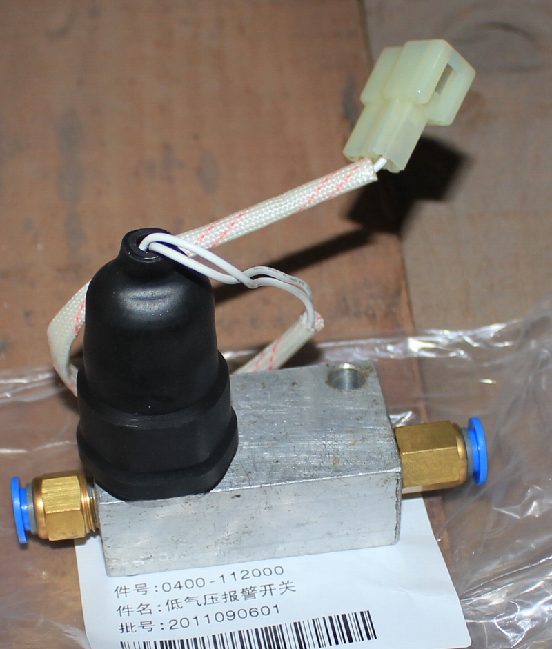 Front passenger door accessories, low air pressure alarm switch