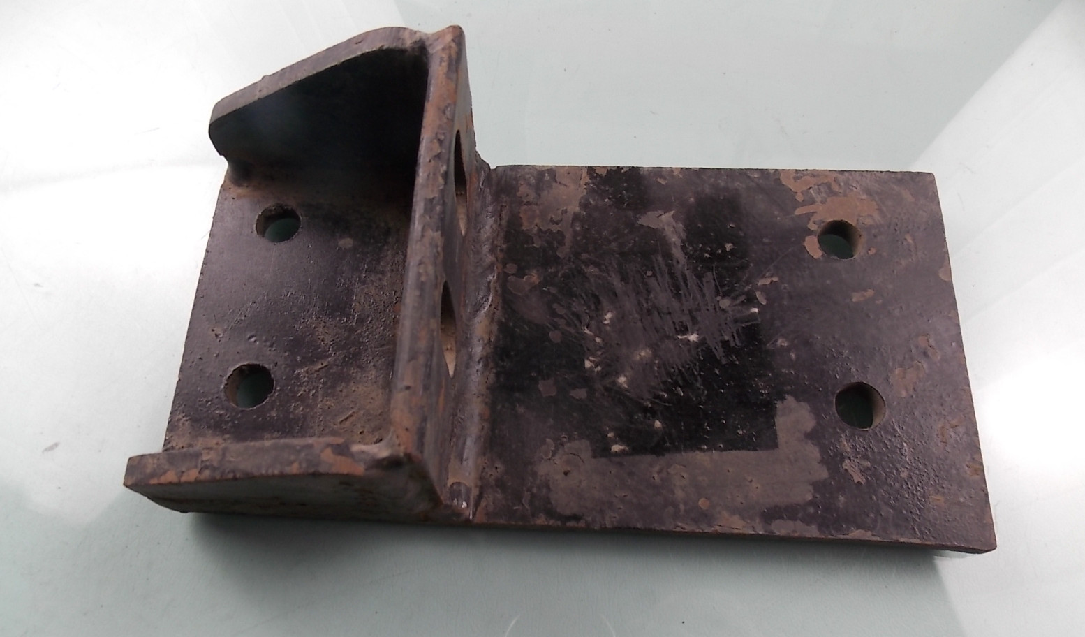 Кронштейн задней подвески верхний левый