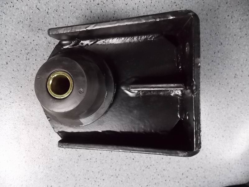 D The right rubber pad in front of the engine-2