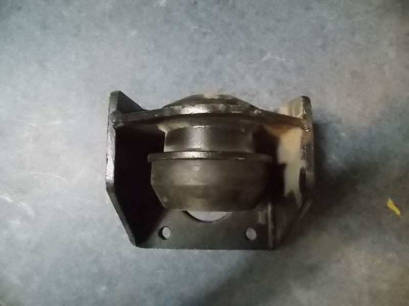 D The right rubber pad of the rear engine