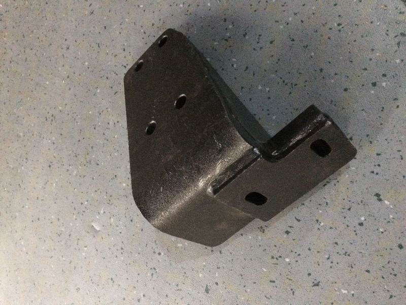 The upper left bracket is placed on the rear of the engine-2