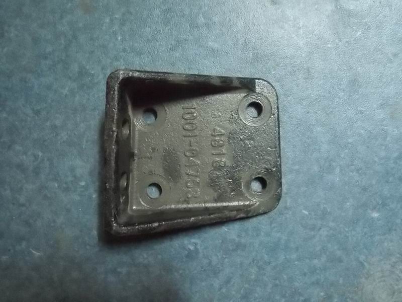 Rear suspension upper left bracket