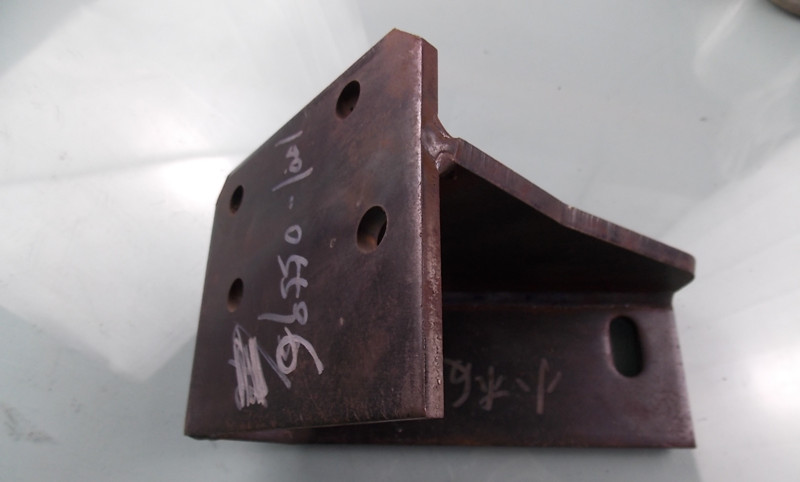 Front suspension lower right bracket (process 20)