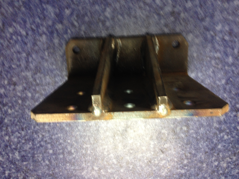 The engine is suspended with the lower left bracket-2