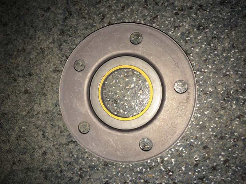 Front oil seal; drive end of air compressor-1