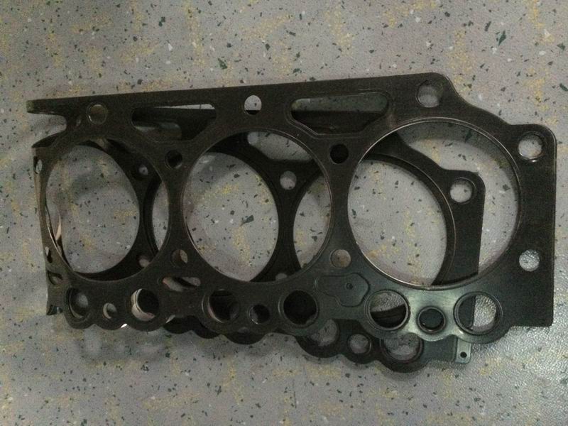 Cylinder head gasket; 1 hole in the lower left corner; 1.24MM thick