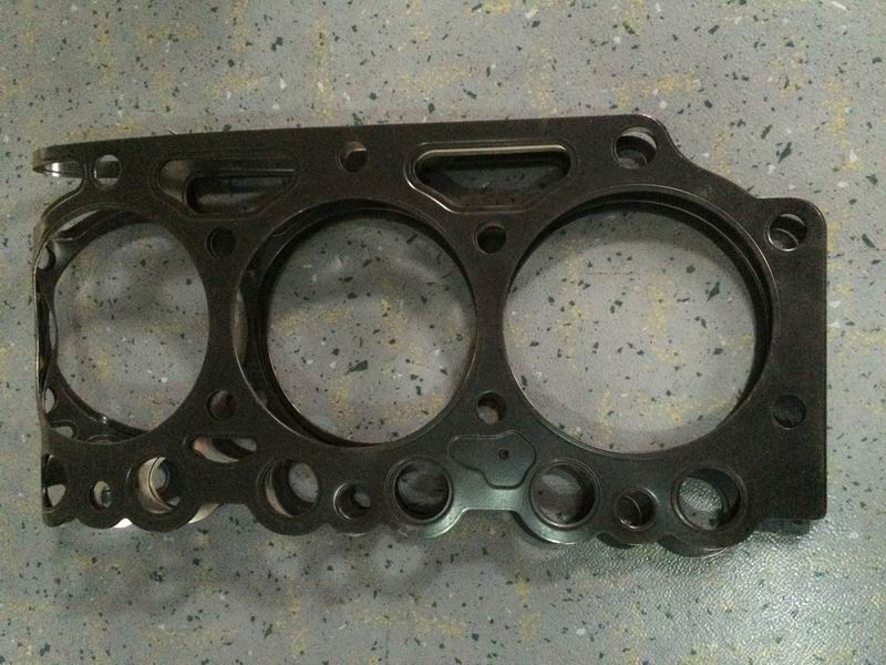 Cylinder head gasket; 3 holes in the lower left corner; 1.44MM thick