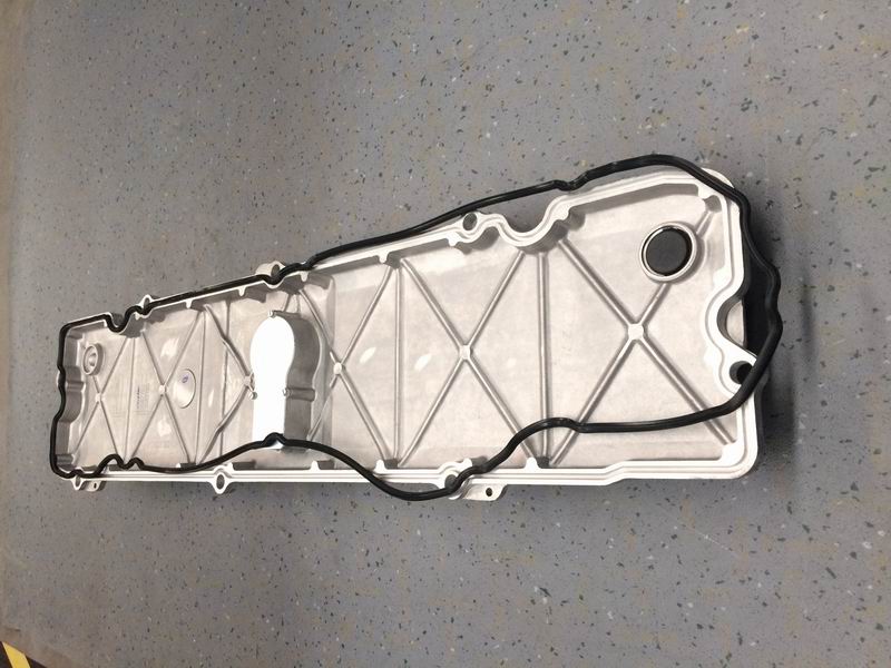 Cylinder head cover; contains sealing gasket